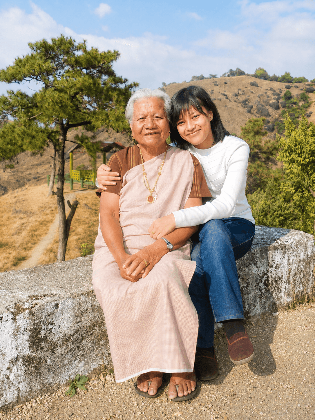 Mei-ieid with her granddaughter — the heart behind TRIS